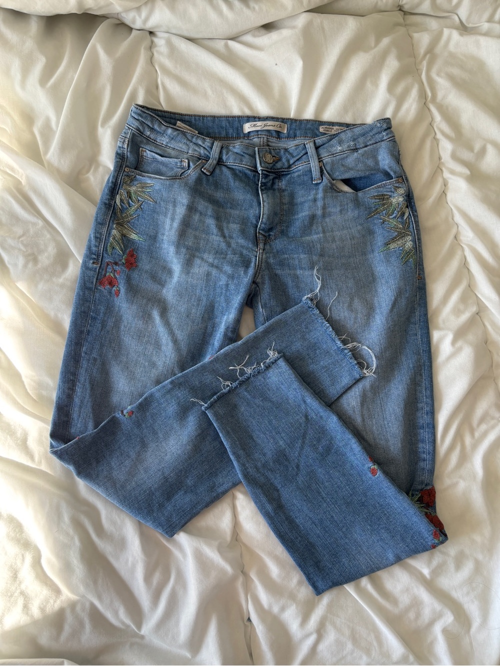 Embroidered Light Blue Skinny Jeans with Distressed Hem